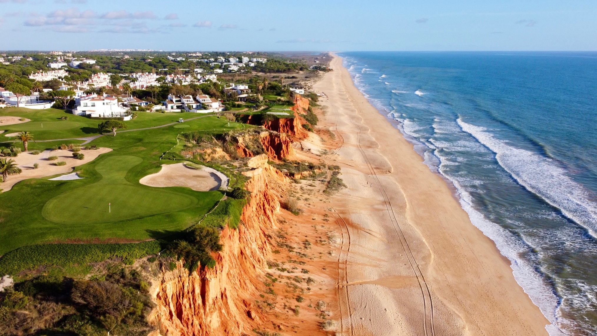 Aerial view of luxury villas and golf course in Quinta do Lago