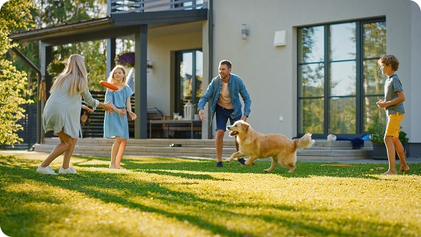 A family relaxing in their garden